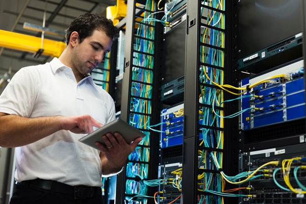 A student working with fiber optics